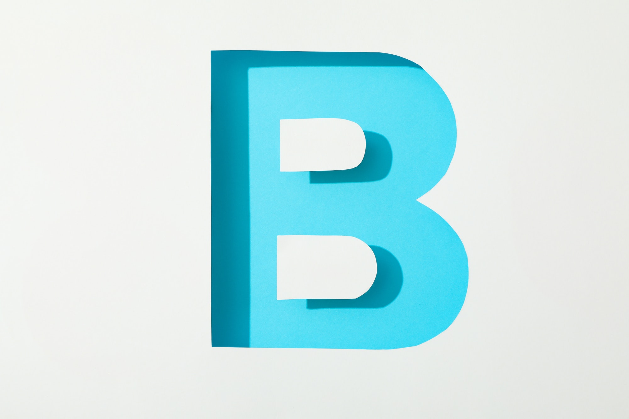 Color letter B on white background, space for text